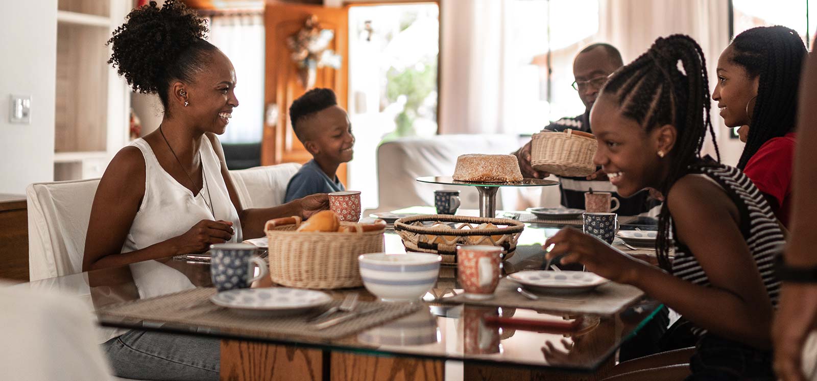 Family eating dinner at home.